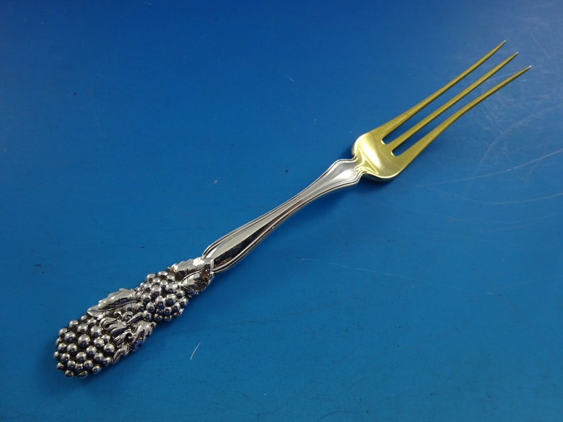 Tiffany Co Blackberry Sterling Silver Fruit Fork 6 Inch Gold Tines: Tiffany Co Blackberry Sterling Silver Fruit Fork 6 Inch Gold Tines This rare sterling silver fruit fork from the Blackberry pattern by Tiffany & Co. features gold-washed tines and measures 6 inches in