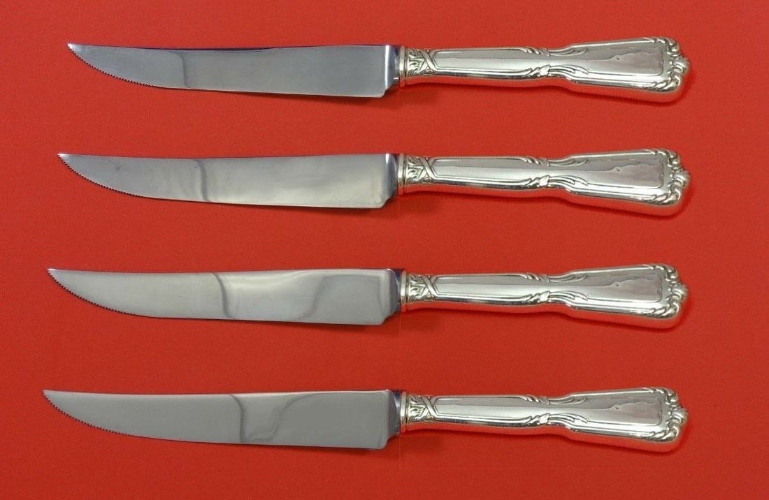 Reed and Barton Chambord Sterling Silver Steak Knife Set 4pc Custom: Reed and Barton Chambord Sterling Silver Steak Knife Set 4pc Custom This exquisite 4-piece steak knife set features the Chambord pattern by Reed and Barton, crafted from sterling silver with a hollow 