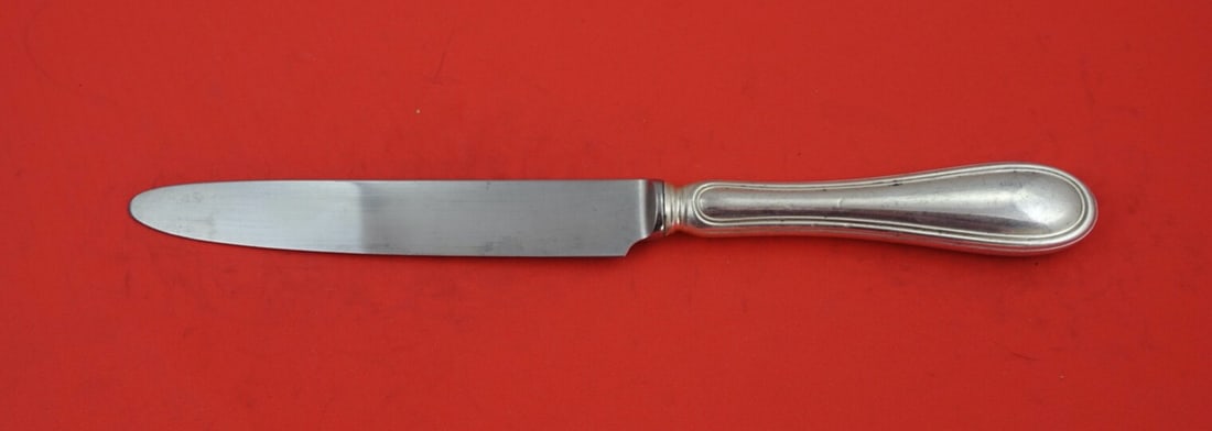 Greggio Giorgio Sterling Silver Dinner Knife French Pointed 9.5": Greggio Giorgio Sterling Silver Dinner Knife French Pointed 9.5" This exquisite dinner knife from the Giorgio pattern by Greggio is crafted from high-quality sterling silver. Its elegant French and po