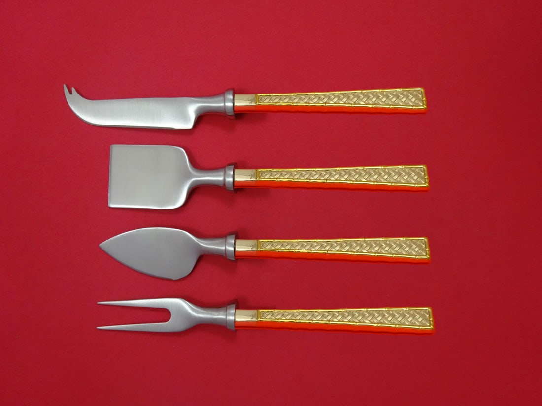 Golden Tradewinds 4pc Sterling Silver Cheese Serving Set by International: Golden Tradewinds 4pc Sterling Silver Cheese Serving Set by International Elevate your hosting experience with the Golden Tradewinds Cheese Serving Set by International Sterling. This exquisite 4-piec