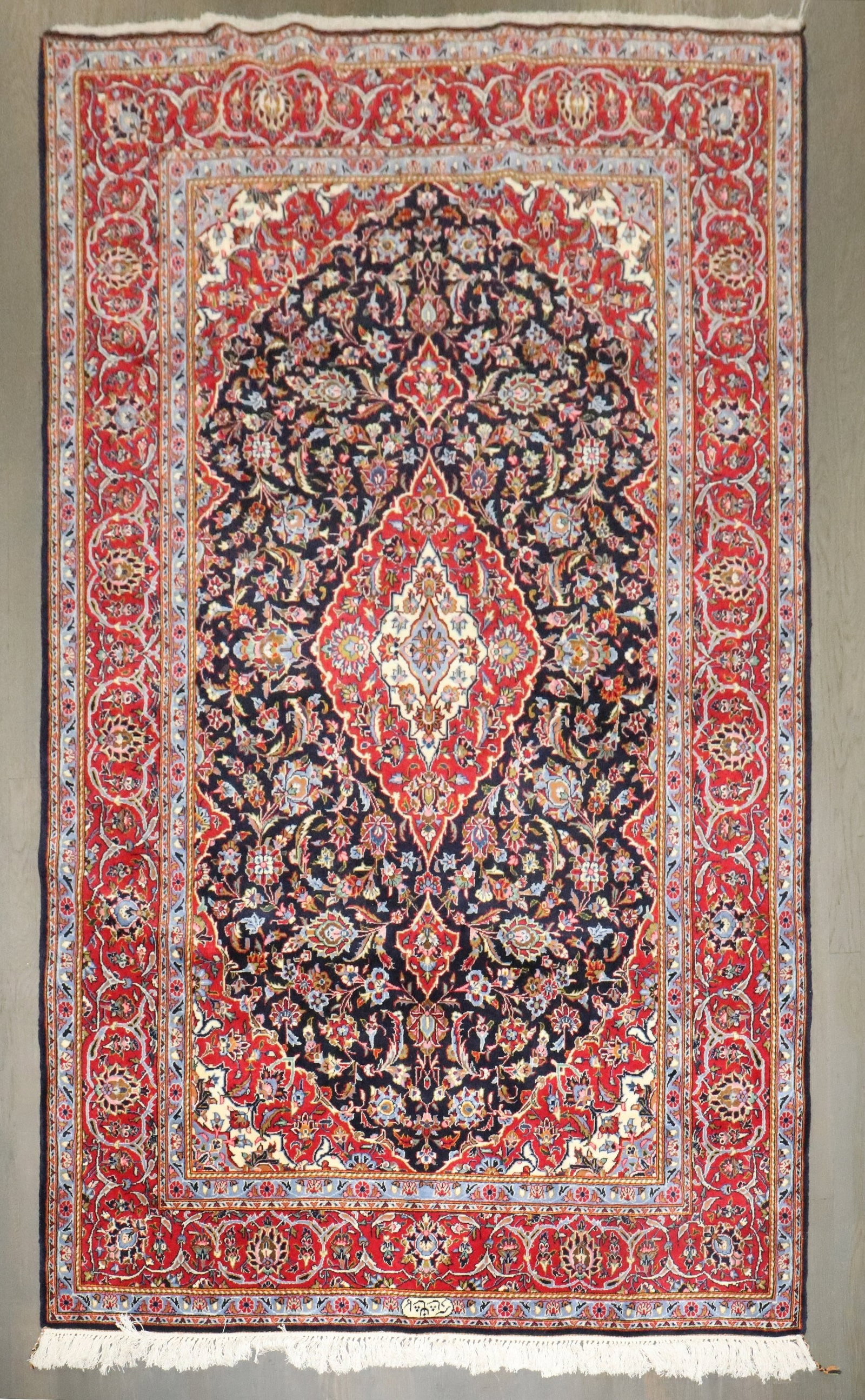 4' 5" x 7' 4" Signed Persian Kashan Accent Rug: 4' 5" x 7' 4" Signed Persian Kashan Accent Rug Vintage signed mid-20th-century Persian traditional Kashan rug in an accent size. This pre-owned piece features the classic Kashan style and retains its 