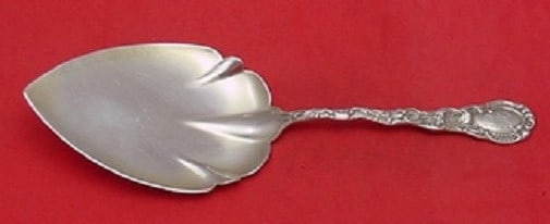 Durgin Louis XV Sterling Silver Goldwashed Pie Server 9 1/4": Durgin Louis XV Sterling Silver Goldwashed Pie Server 9 1/4" This exquisite pie server is crafted from sterling silver and features a luxurious goldwash finish. Designed in the elegant Louis XV patter
