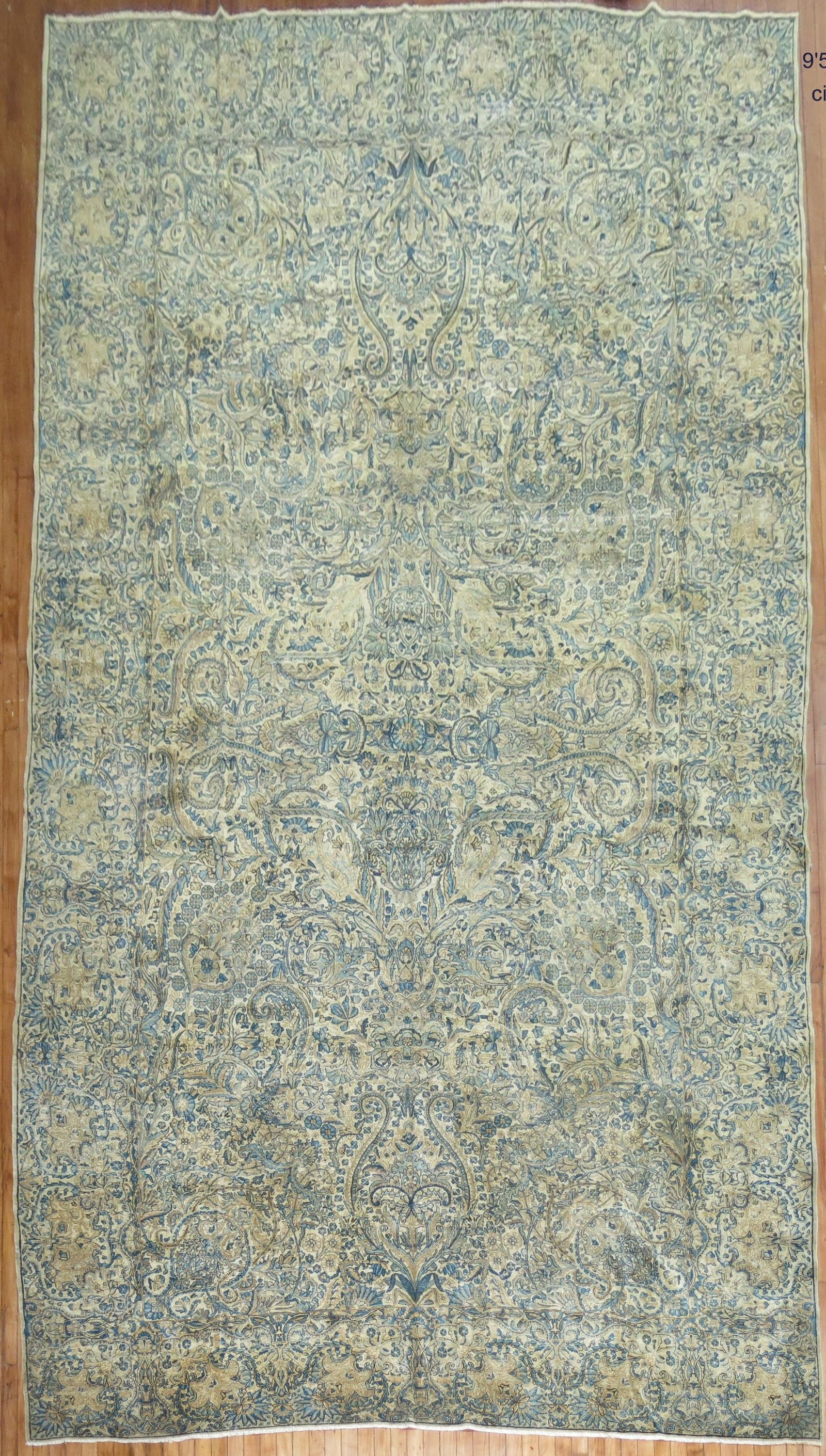 9' 5" x 17' 8" Persian Kerman Oversize Rug 1920s: 9' 5" x 17' 8" Persian Kerman Oversize Rug 1920s Oversize Persian Kerman rug from the 1920s. This pre-owned piece features the classic Kerman rug type and offers a substantial format suited to larger 