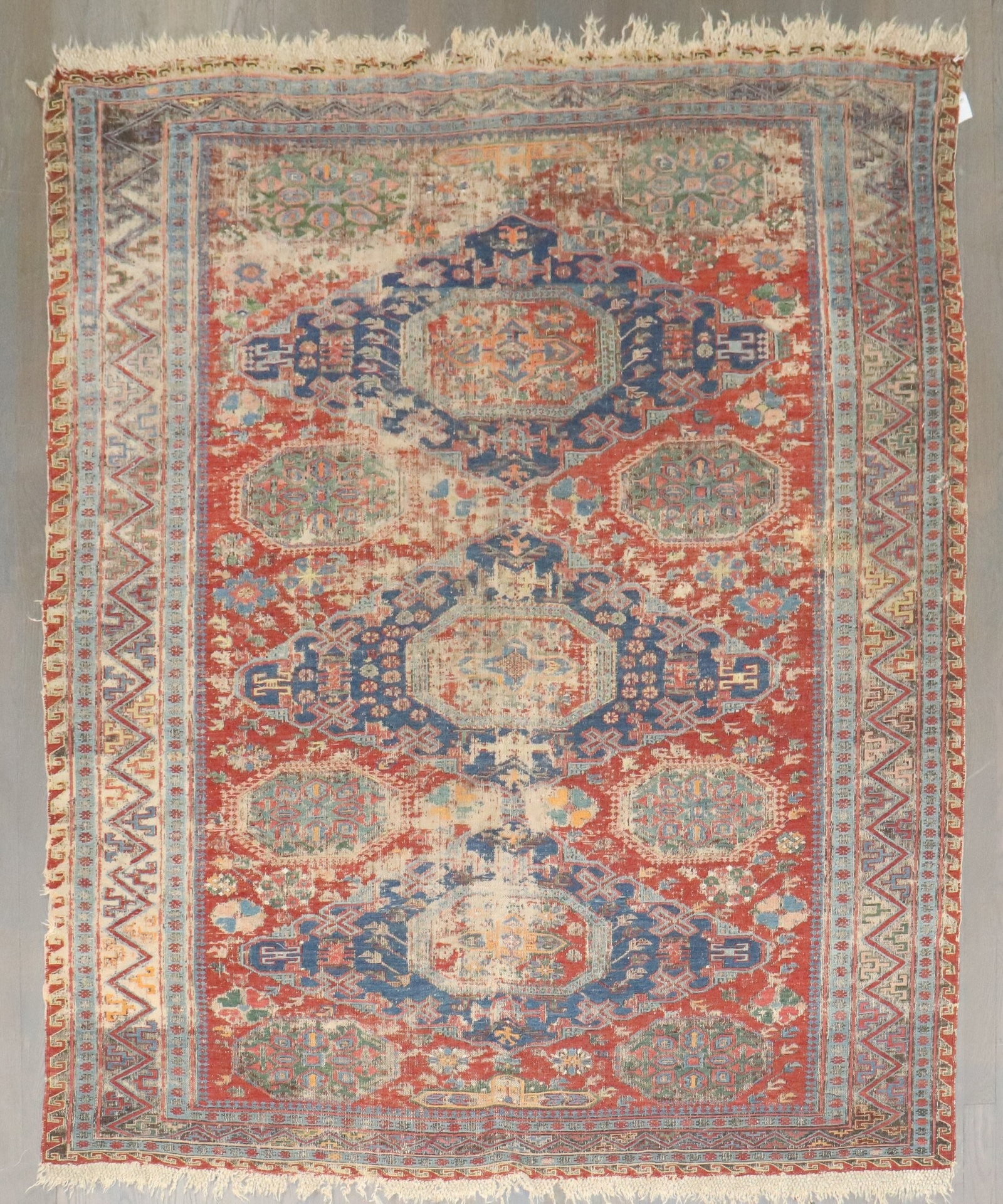 5' 4" x 6' 2" Square Soumac Accent Rug Late 19th Century: 5' 4" x 6' 2" Square Soumac Accent Rug Late 19th Century Distressed late 19th century Soumac flatweave rug in a square accent size. This pre-owned piece features a worn, shabby chic character consiste