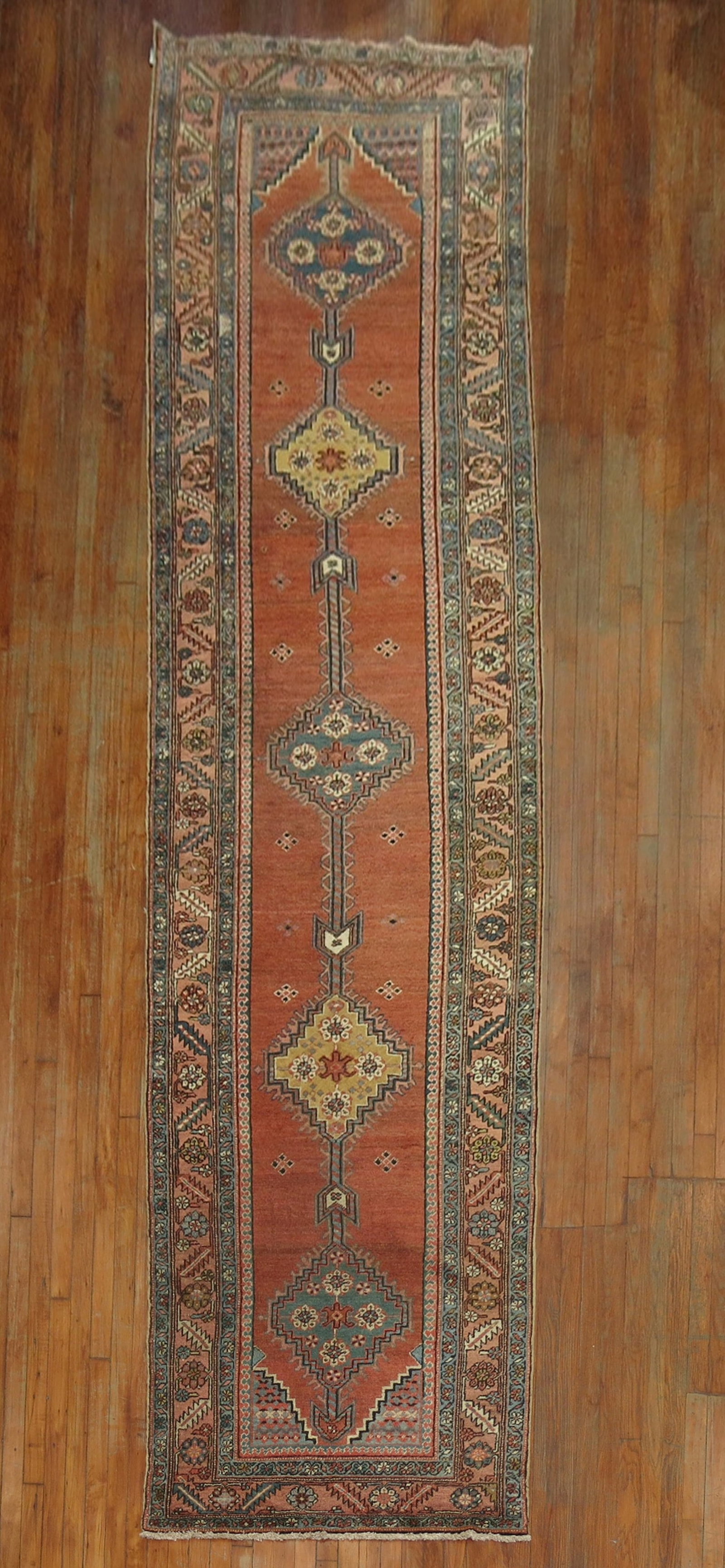 3' 5" x 15' 4" Persian Serapi Heriz Runner Rug: 3' 5" x 15' 4" Persian Serapi Heriz Runner Rug Early 20th century tribal antique Persian Serapi runner with a geometric pattern. Classified as a Serapi/Heriz runner and offered in pre-owned condition.