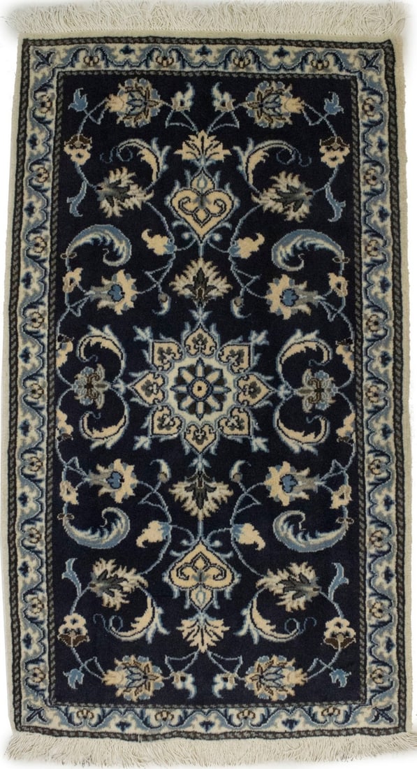 Handmade Wool Area Rug with Navy Floral Pattern 2'5 x 4'3: Handmade Wool Area Rug with Navy Floral Pattern 2'5 x 4'3 This hand-knotted Nain Oriental rug features a classic floral design in navy, cream, blue, and beige tones. Made from wool, the rug has a rect
