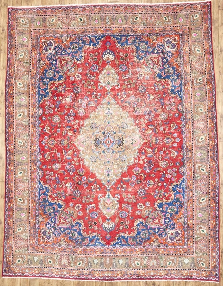 Hand Knotted Wool Floral Oriental Area Rug 9'8 x 12'6: Hand Knotted Wool Floral Oriental Area Rug 9'8 x 12'6 This semi-antique hand-knotted wool area rug features a traditional Oriental design with a distressed floral pattern in muted tones of red, pastel