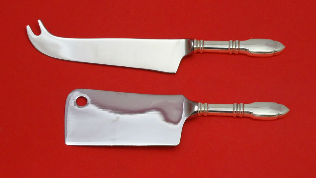 Robert Bruce Graff W & D Sterling Silver Cheese Serving Set 2pc: Robert Bruce Graff W & D Sterling Silver Cheese Serving Set 2pc Elevate your dining experience with this exquisite Robert Bruce by Graff W & D Sterling Silver Cheese Serving Set. This custom-made two-