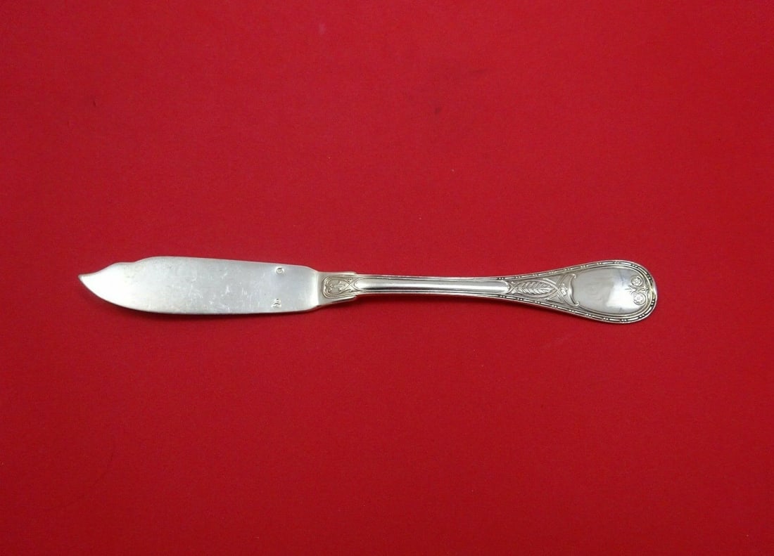 Christofle Brienne Sterling Silver Fish Knife 8 1/8": Christofle Brienne Sterling Silver Fish Knife 8 1/8" This exquisite fish knife from Christofle's Brienne pattern is crafted from high-quality sterling silver, making it a luxurious addition to any din