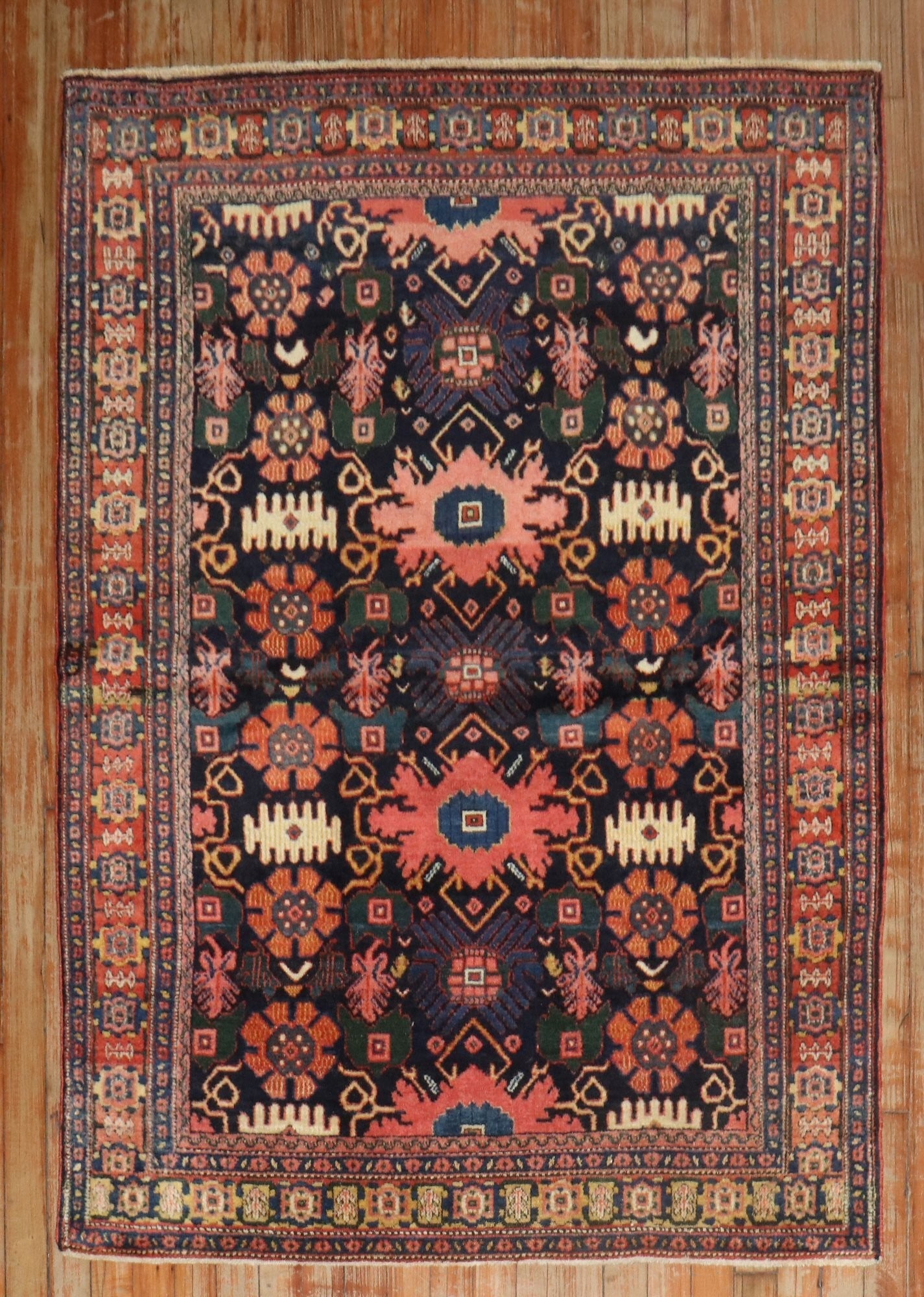 3' 7" x 5' Persian Senneh Rug Early 20th Century Navy: 3' 7" x 5' Persian Senneh Rug Early 20th Century Navy Early 20th century Persian Senneh rug with intricate geometric patterning. This pre-owned small rug offers a classic antique look and is identifie