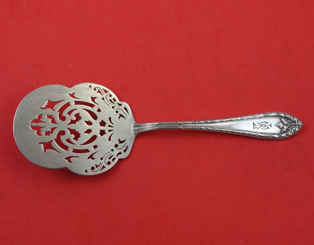 Dominick & Haff Marie Antoinette Sterling Silver Pierced Tomato Server 8 in: Dominick & Haff Marie Antoinette Sterling Silver Pierced Tomato Server 8 in This exquisite 8" tomato server is part of the Marie Antoinette pattern by Dominick & Haff, crafted from high-quality sterli