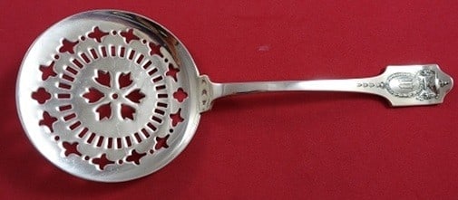 Shreve Adam Sterling Silver Pierced Tomato Server 7 3/8 in: Shreve Adam Sterling Silver Pierced Tomato Server 7 3/8 in Sterling silver tomato server in the Adam pattern by Shreve. This pierced serving piece measures 7 3/8 inches and is monogrammed. It is descr
