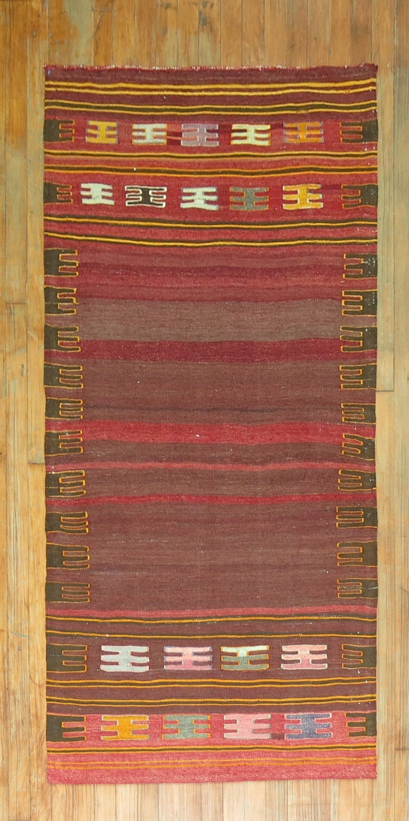 2' 11" x 5' 5" Antique Persian Sofreh Flat Weave Kilim: 2' 11" x 5' 5" Antique Persian Sofreh Flat Weave Kilim Antique Persian Sofreh kilim with a minimalist flat-weave design, dating to circa 1920. This pre-owned small-format rug reflects traditional Pers