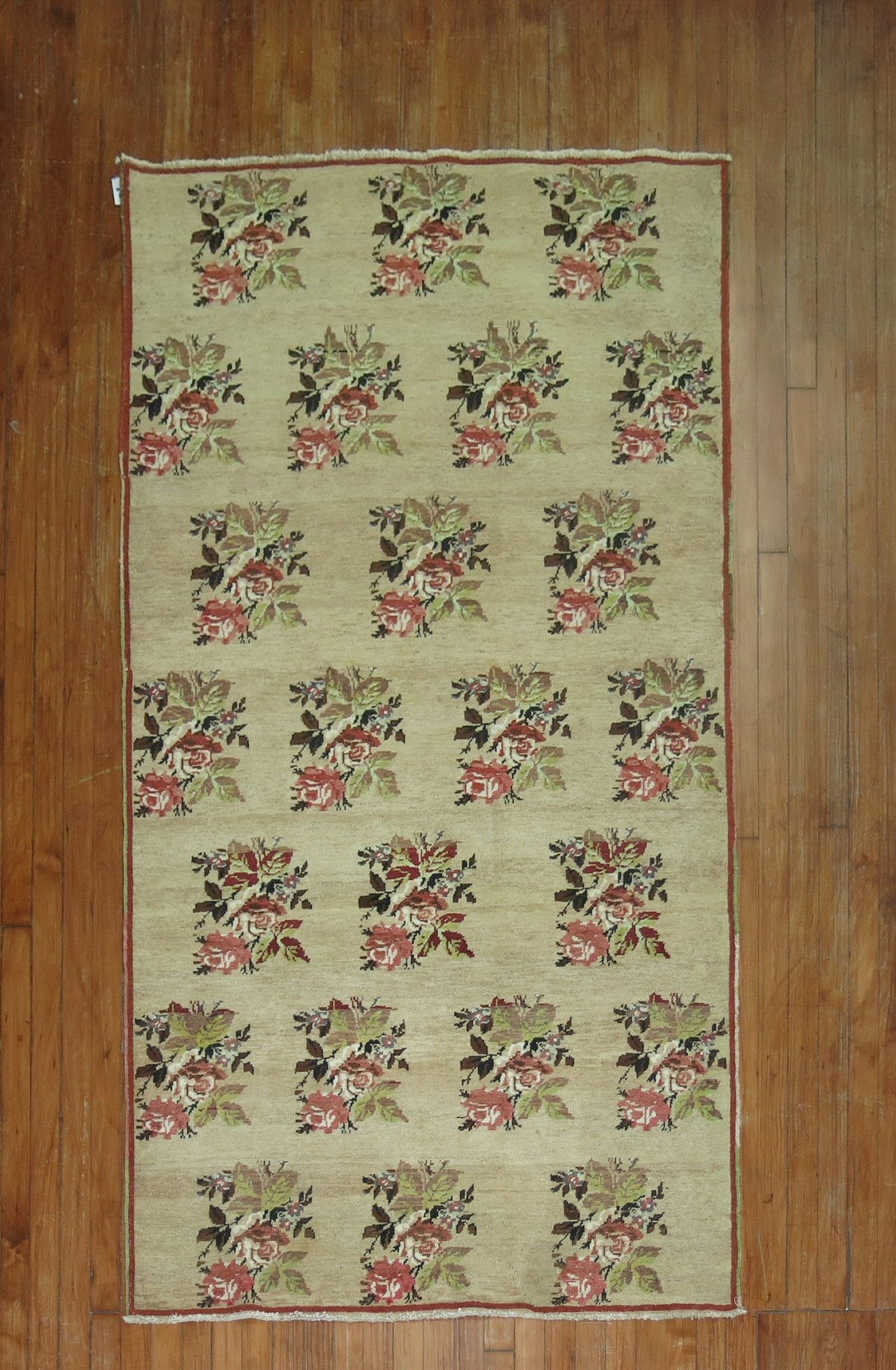 3' 10" x 7' 2" Mid Century Turkish Konya Accent Rug: 3' 10" x 7' 2" Mid Century Turkish Konya Accent Rug Vintage Turkish Konya rug from the mid 20th century featuring a floral, borderless design. This pre-owned accent rug offers a classic rectangular fo