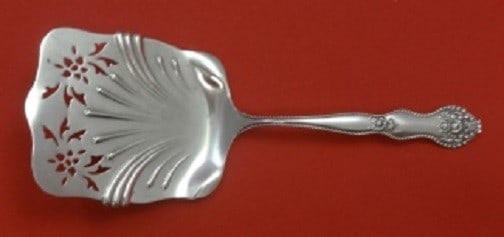 Mount Vernon Adolphus Sterling Silver Waffle Server 7 7/8": Mount Vernon Adolphus Sterling Silver Waffle Server 7 7/8" This exquisite waffle server, measuring 7 7/8 inches, is crafted in sterling silver and features the elegant Adolphus pattern by Mount Vernon