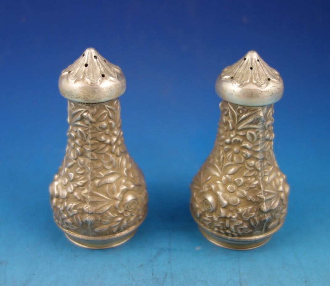 Sterling Silver Repousse Salt and Pepper Shakers Set by Kirk 2 Piece: Sterling Silver Repousse Salt and Pepper Shakers Set by Kirk 2 Piece This Kirk Repousse sterling silver salt and pepper shaker set features an intricate floral design inspired by the traditional metal