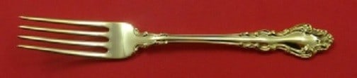 Reed and Barton Spanish Baroque Gold Sterling Silver Fork 7 3/8": Reed and Barton Spanish Baroque Gold Sterling Silver Fork 7 3/8" This exquisite fork from the Spanish Baroque pattern by Reed and Barton is crafted from sterling silver, showcasing a stunning gold fin