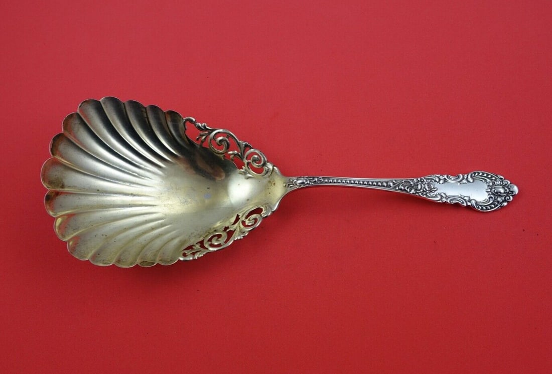 Knowles Mauser Apollo Sterling Silver Gold Washed Cracker Scoop 9 1/8 Inches: Knowles Mauser Apollo Sterling Silver Gold Washed Cracker Scoop 9 1/8 Inches This sterling silver cracker scoop features the Apollo pattern by Knowles and Mauser. It has pierced shoulders and a gold-w