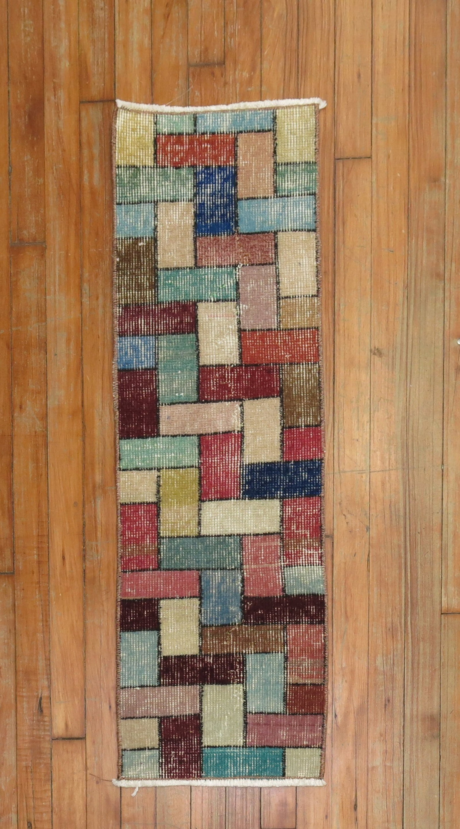 1' 1" x 3' 2" Turkish Deco Yastik Rug Mosaic Pattern: 1' 1" x 3' 2" Turkish Deco Yastik Rug Mosaic Pattern Vintage mid-20th century Turkish Deco yastik rug featuring an all-over mosaic motif. This pre-owned piece offers a compact format and distinctive g