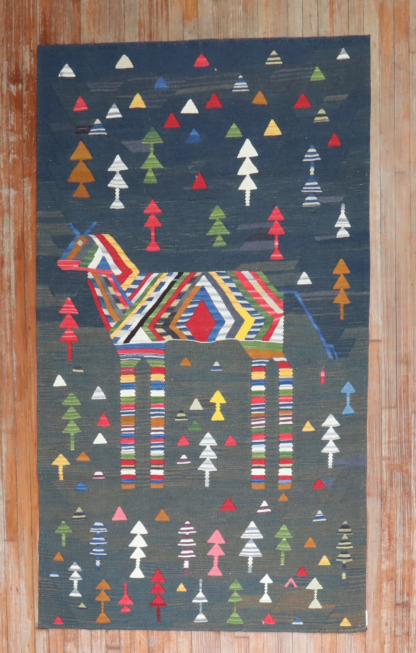 4' 3" x 7' 2" Persian pictorial Kilim accent rug: 4' 3" x 7' 2" Persian pictorial Kilim accent rug Late 20th century Persian accent rug in a pictorial Soumac/Kilim flatweave style. This pre-owned piece is described as a quirky pictorial wall flatweav