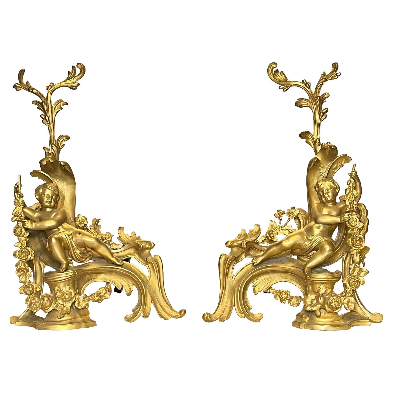 Set of Two Louis XVI Style Gilt Bronze Cherub Figural Andirons 19th Century: Set of Two Louis XVI Style Gilt Bronze Cherub Figural Andirons 19th Century This pair of late 19th-century French Louis XVI style andirons features elaborate gilt bronze construction with cherub motif