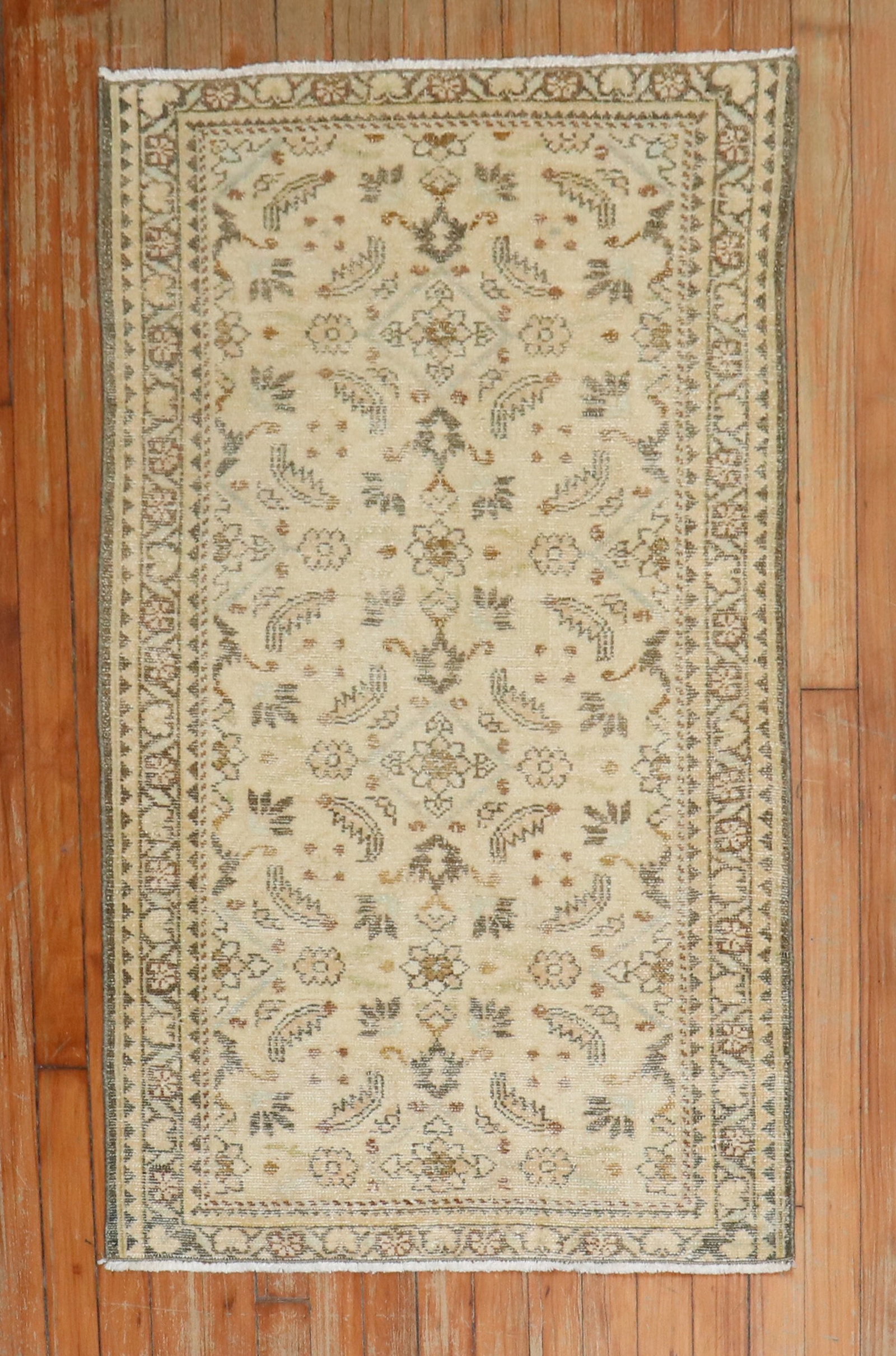 2' 4" x 3' 9" 1930s Persian Lilihan Small Rug: 2' 4" x 3' 9" 1930s Persian Lilihan Small Rug Pre-owned 1930s Persian Lilihan scatter rug featuring brown accents on a bone color ground with an intricate floral pattern. Specifications Item Type: Sca