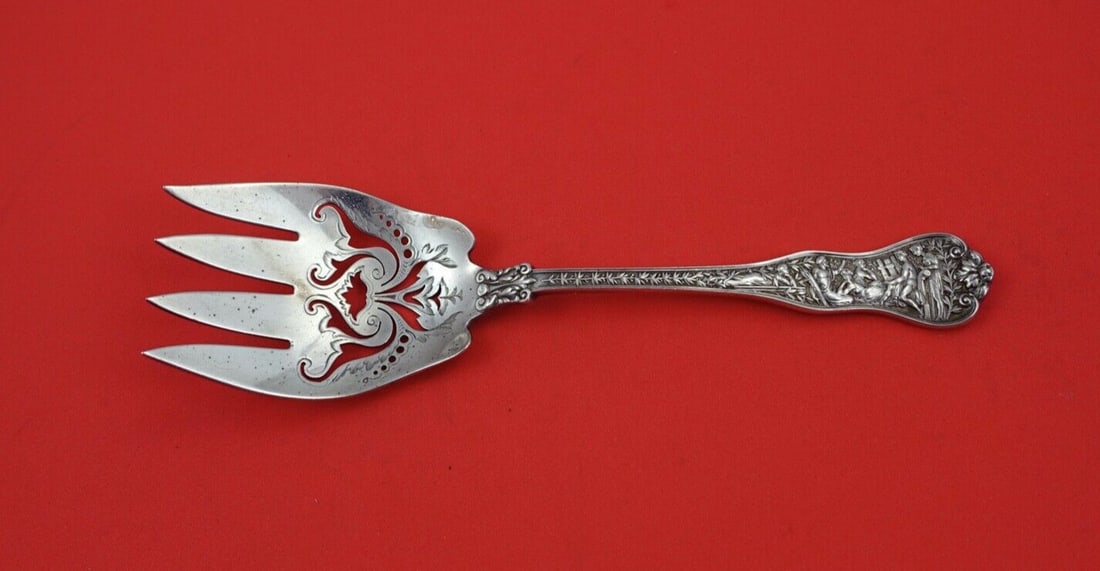 Tiffany & Co Olympian Sterling Silver Fish Serving Fork 7 1/2" Monogrammed: Tiffany & Co Olympian Sterling Silver Fish Serving Fork 7 1/2" Monogrammed This exquisite serving fork from the Olympian pattern by Tiffany & Co. is a stunning addition to any silverware collection. C