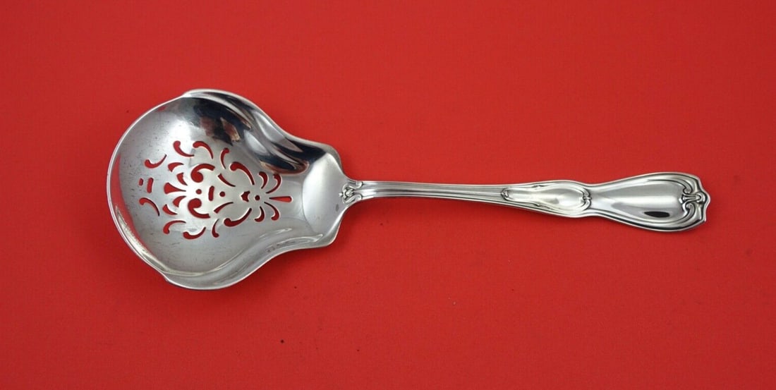 Gorham La Modele Sterling Silver Pierced Ice Spoon 8.5": Gorham La Modele Sterling Silver Pierced Ice Spoon 8.5" This elegant La Modele ice spoon by Gorham is crafted from high-quality sterling silver. At 8 1/2 inches in length, it features a beautifully pi