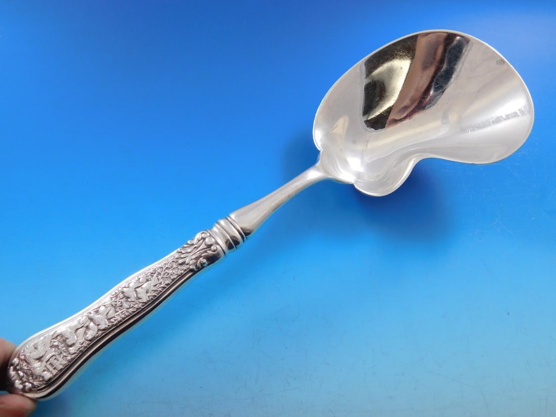 Tiffany & Co Olympian Sterling Silver Berry Spoon Kidney Shape 9 3/8": Tiffany & Co Olympian Sterling Silver Berry Spoon Kidney Shape 9 3/8" This exquisite serving spoon is from the Olympian pattern by Tiffany & Co., crafted from high-quality sterling silver. The spoon f