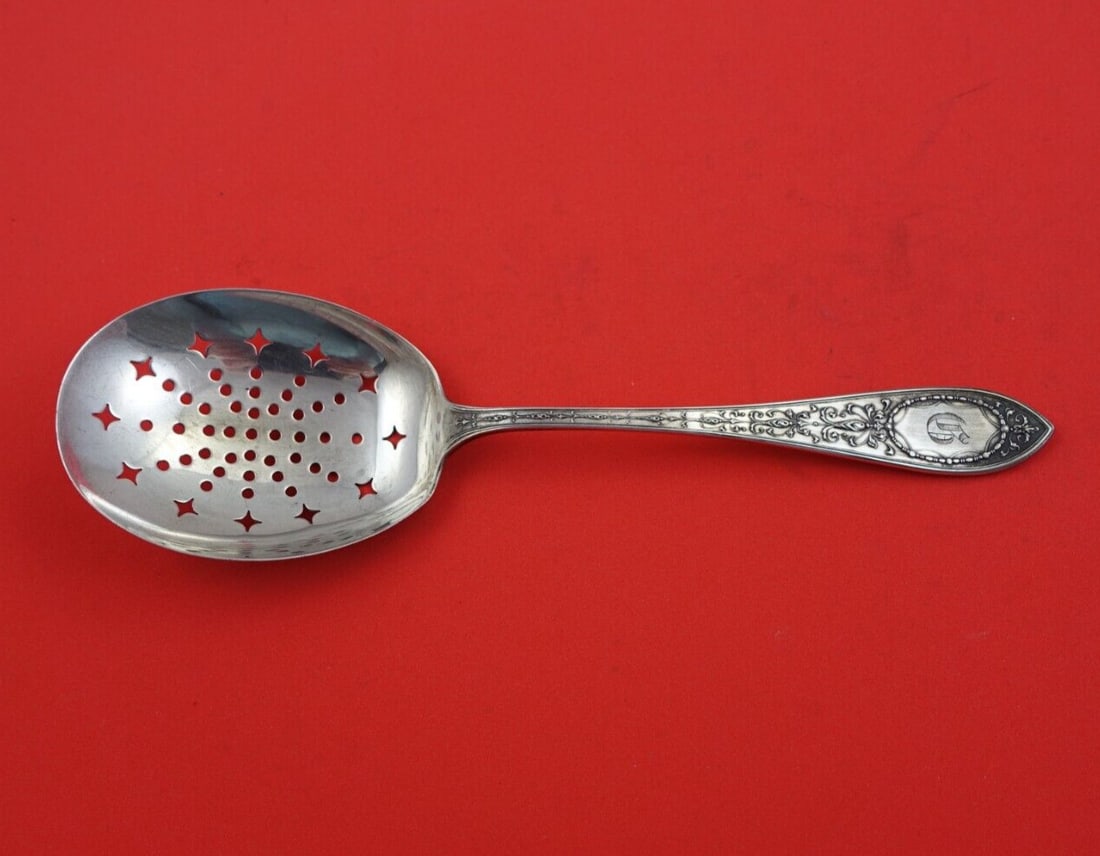 Whiting Adam Sterling Silver 8 Inch Slotted Ice Spoon: Whiting Adam Sterling Silver 8 Inch Slotted Ice Spoon This exquisite slotted ice spoon is crafted from sterling silver and features the elegant ADam pattern by Whiting. Measuring 8 inches, it is an he