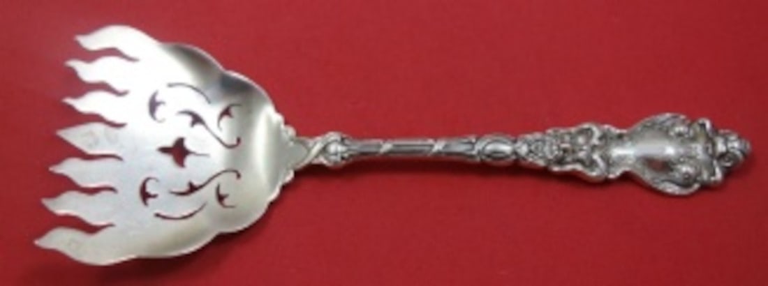 Unger Douvaine sterling silver pierced sardine serving fork 5 3/4": Unger Douvaine sterling silver pierced sardine serving fork 5 3/4" A sterling silver sardine serving fork in the Douvaine pattern by Unger. This pierced 7-tine fork measures 5 3/4 inches and is not mo