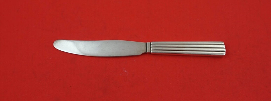 Georg Jensen Bernadotte Sterling Silver Tea Knife 6 5/8": Georg Jensen Bernadotte Sterling Silver Tea Knife 6 5/8" Experience the elegance of the Bernadotte Sterling Silver Tea Knife, crafted by Georg Jensen. This exquisite serving piece, measuring 6 5/8 inc