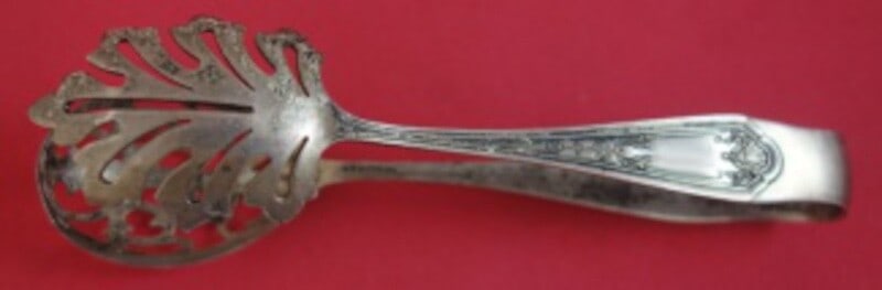 Watson Queen Louise Sterling Silver Ice Tong 6.5 Inches: Watson Queen Louise Sterling Silver Ice Tong 6.5 Inches Enhance your serving experience with this exquisite Queen Louise Ice Tong by Watson. Crafted from high-quality sterling silver, this pierced ice