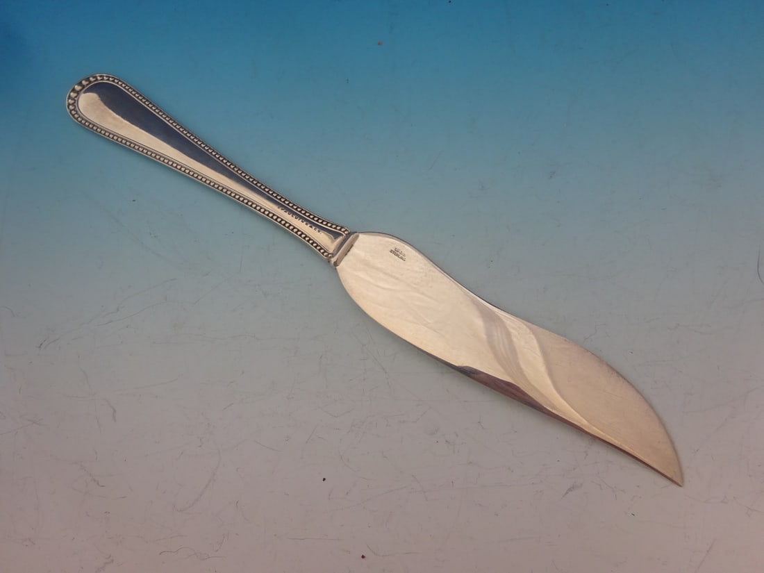 Gorham Newcastle Sterling Silver Fish Knife 8 1/4 Inch Monogrammed: Gorham Newcastle Sterling Silver Fish Knife 8 1/4 Inch Monogrammed This exquisite fish knife is part of the Newcastle pattern by Gorham, crafted from high-quality sterling silver. Measuring 8 1/4 inch