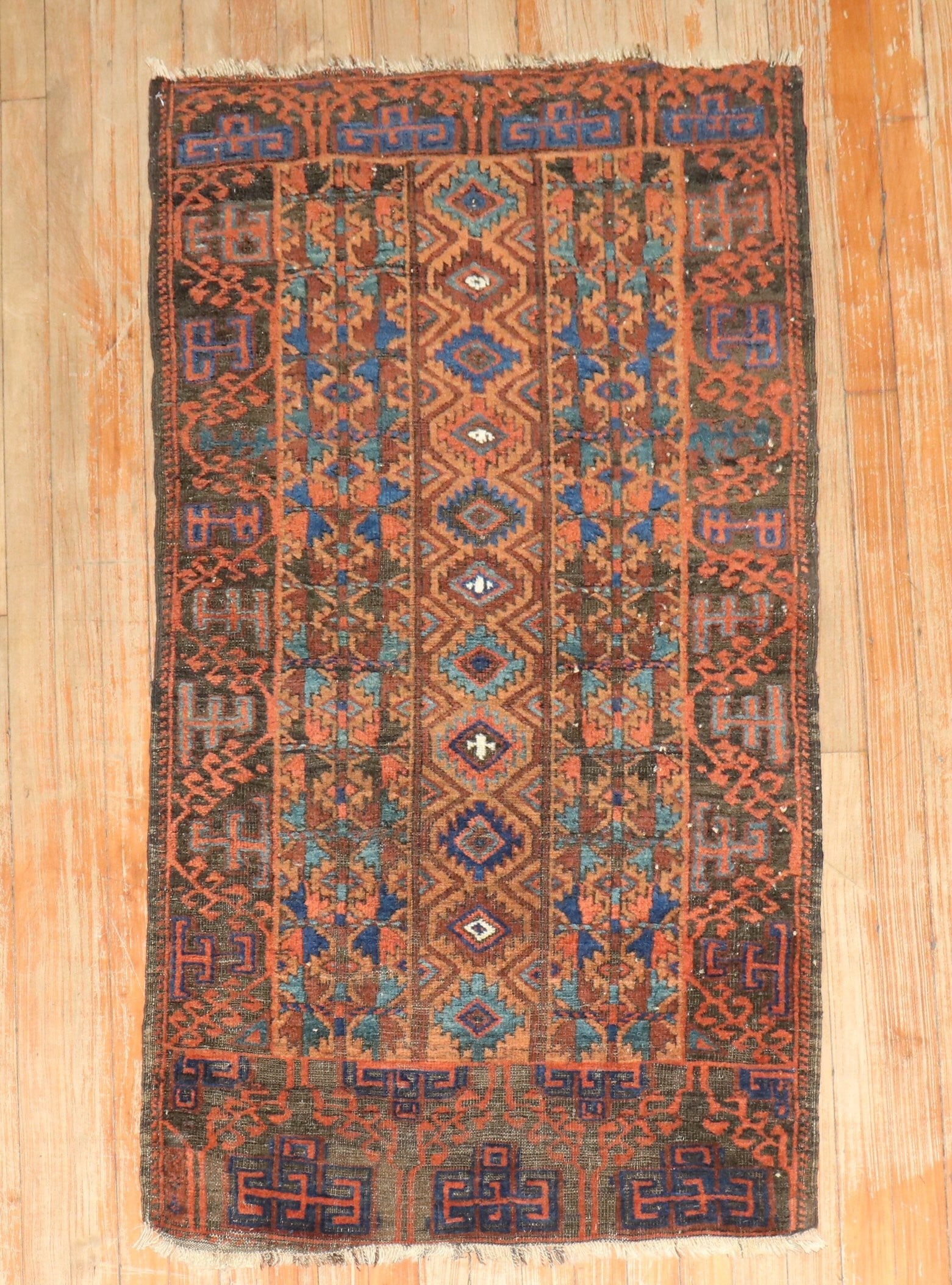 2' 6" x 4' 8" Late 19th Century Balouch Small Rug: 2' 6" x 4' 8" Late 19th Century Balouch Small Rug Late 19th century Balouch tribal rug in a small scatter size. This pre-owned piece reflects traditional Balouch craftsmanship and is identified as a B