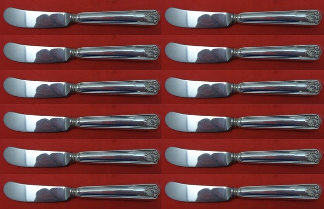 Frank Smith Fiddle Shell Sterling Silver Butter Spreader Set 12 pcs: Frank Smith Fiddle Shell Sterling Silver Butter Spreader Set 12 pcs This exquisite 12-piece butter spreader set features the elegant Fiddle Shell pattern by Frank Smith. Each piece is crafted from hig