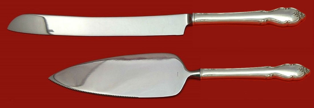 2 Piece Wedding Cake Serving Set International Breton Rose Sterling Silver: 2 Piece Wedding Cake Serving Set International Breton Rose Sterling Silver A two-piece wedding cake serving set in the Breton Rose pattern by International. The set features custom-made hollow handles