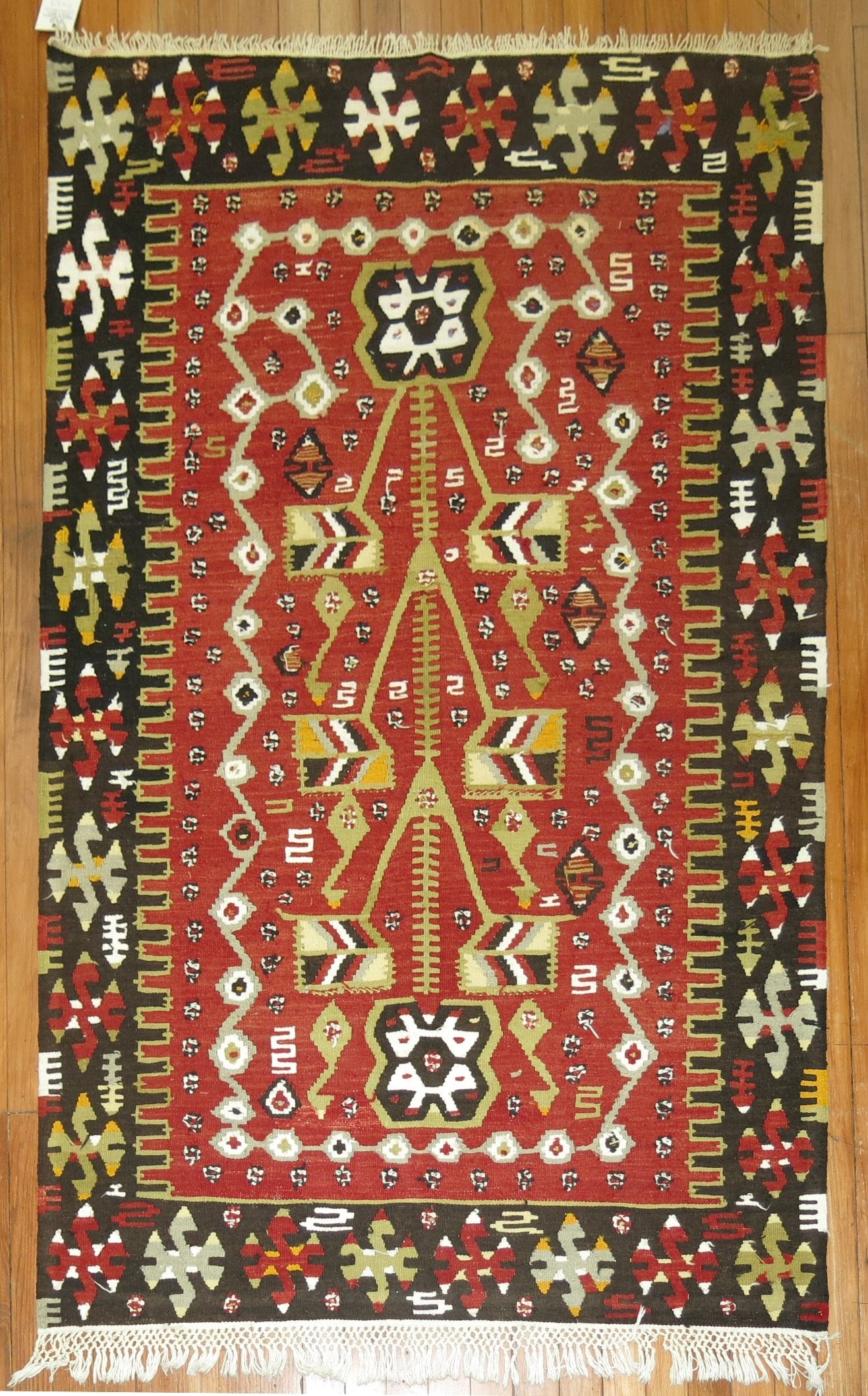 3' 7" x 5' 5" Mid 20th Century Turkish Kilim Rug: 3' 7" x 5' 5" Mid 20th Century Turkish Kilim Rug Traditional Turkish kilim from the middle of the 20th century. This pre-owned small rug is identified as a kilim. Specifications Origin: Turkey Type: K