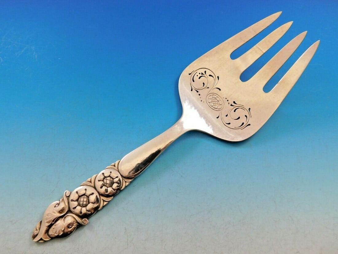 Georg Jensen Dahlia Sterling Silver Fish Serving Fork with Dolphins 9.5 Inch: Georg Jensen Dahlia Sterling Silver Fish Serving Fork with Dolphins 9.5 Inch This captivating sterling silver fish serving fork is part of the renowned Dahlia pattern by Georg Jensen. Measuring 9 1/2 