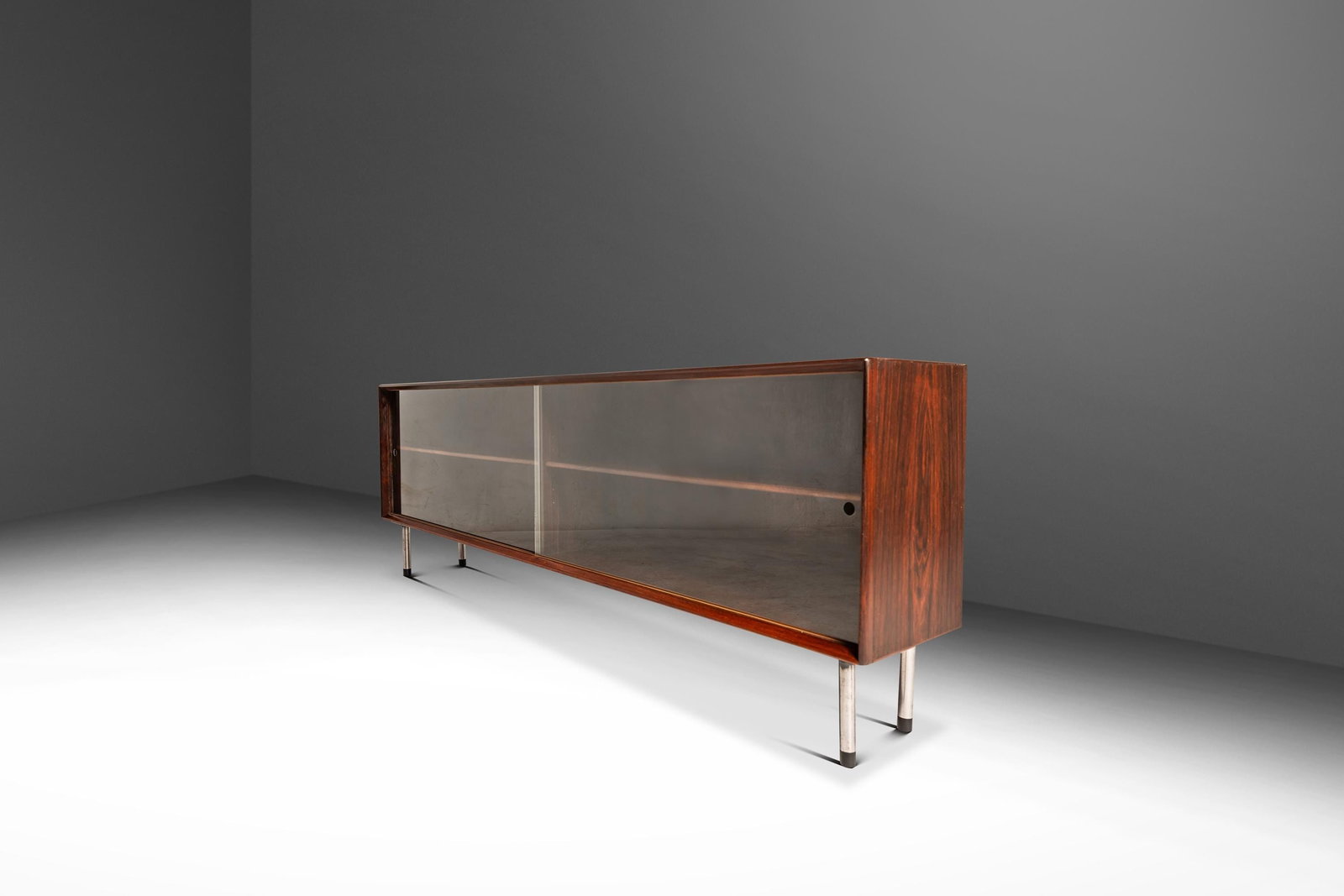 Danish Rosewood Display Cabinet Bookcase with Sliding Glass Doors 71 in: Danish Rosewood Display Cabinet Bookcase with Sliding Glass Doors 71 in Bespoke Danish mid-century modern low-profile display cabinet, sofa table, or bookcase crafted in rosewood with sliding glass do