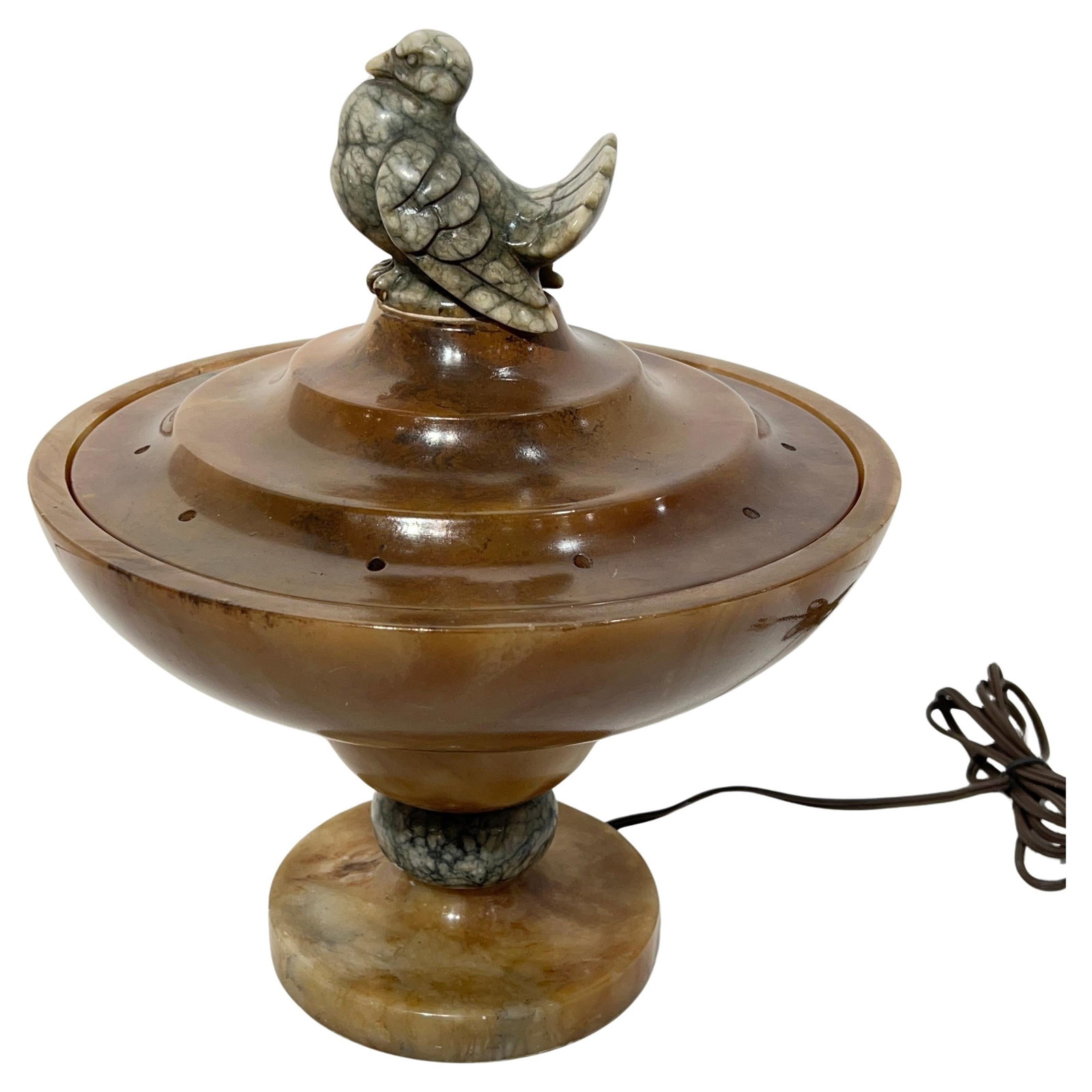 Italian Alabaster Lamp Featuring Sculpted Bird Finial Art Deco Era: Italian Alabaster Lamp Featuring Sculpted Bird Finial Art Deco Era This Art Deco Italian lamp features a sculptural design with a stylized bird motif, finely hand-carved from alabaster. The circular s