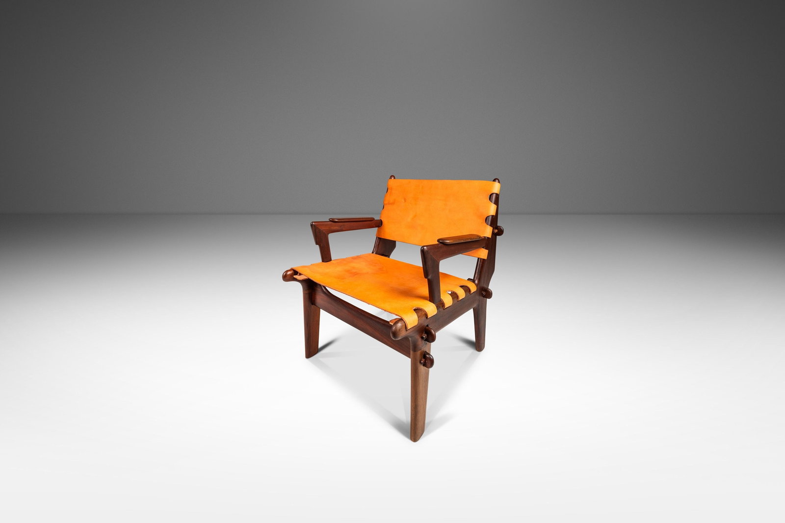 Rare Restored Angel Pazmino Mid-Century Leather Sling Chair Ecuador 1960s: Rare Restored Angel Pazmino Mid-Century Leather Sling Chair Ecuador 1960s Introducing a rare Mid-Century Modern Tooled Leather Sling / Safari Lounge Chair by the renowned Angel Pazmino, crafted in Ecu