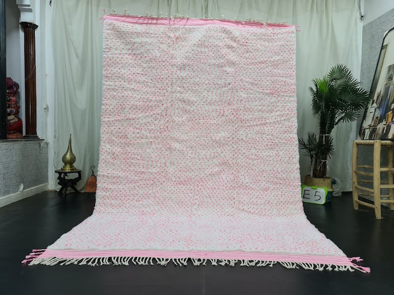 Authentic Handwoven White Pink Dotted Rug from Morocco 8 x 5 Feet: Authentic Handwoven White Pink Dotted Rug from Morocco 8 x 5 Feet This authentic White Pink Dotted Rug is handwoven in the Atlas Mountains by skilled local Berber women weavers. Crafted using traditio