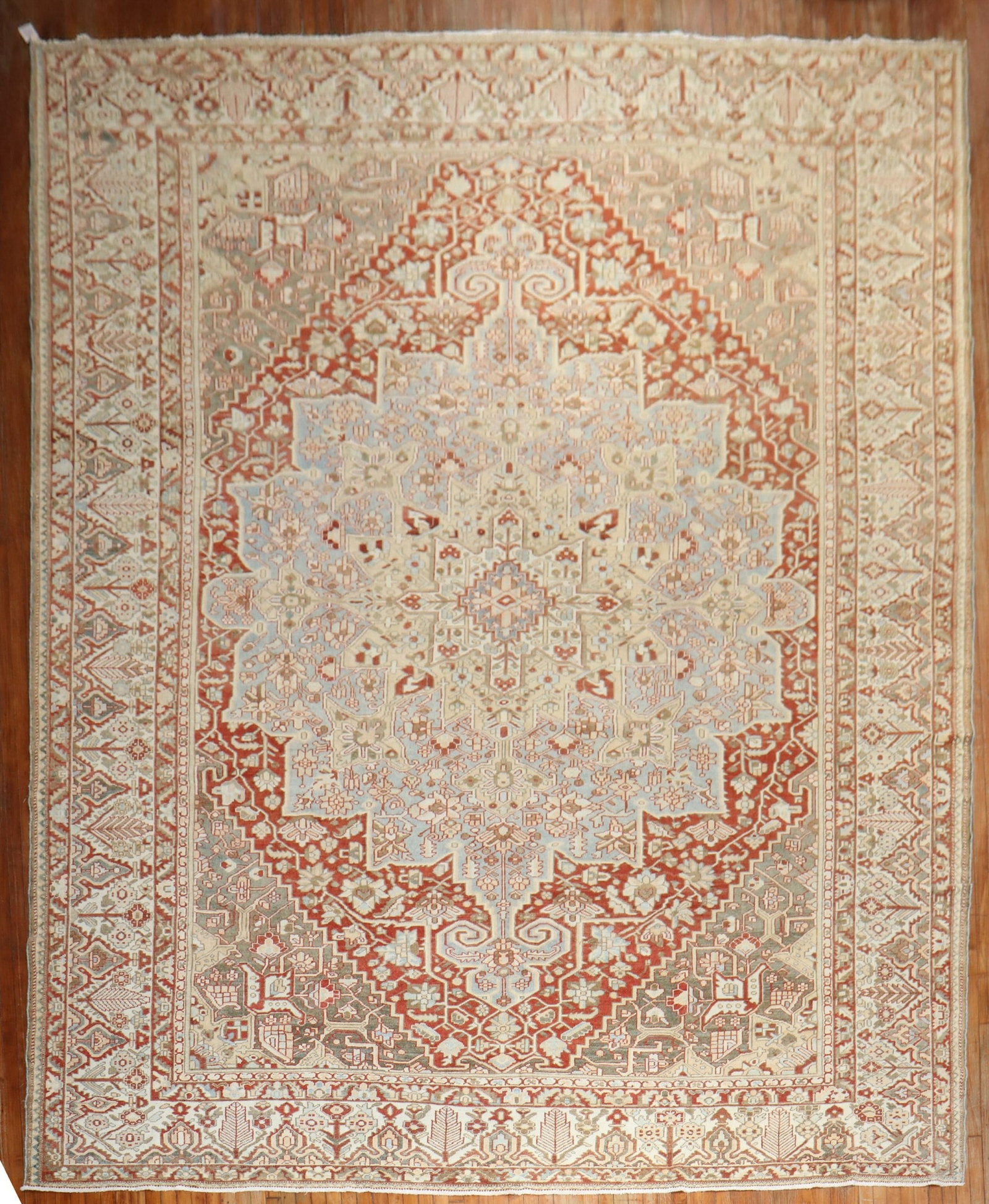 12' 1" x 16' 7" Persian Bakhtiari area rug 1930s: 12' 1" x 16' 7" Persian Bakhtiari area rug 1930s Pre-owned Persian Bakhtiari oversize rug from the 1930s. It features a rust, brown, and gray palette with a traditional patterned design. Specification