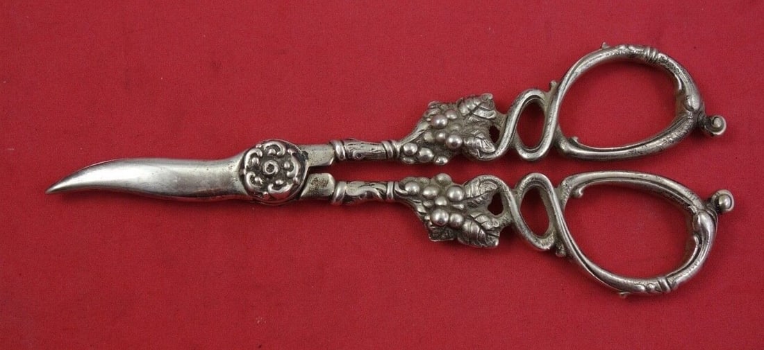 Sterling Silver Grape Shears Heavy Cast Design 6 5/8 Inches: Sterling Silver Grape Shears Heavy Cast Design 6 5/8 Inches These exquisite Sterling Silver Grape Shears feature a heavy cast design of grapes and twisted vines, measuring 6 5/8 inches. Crafted
