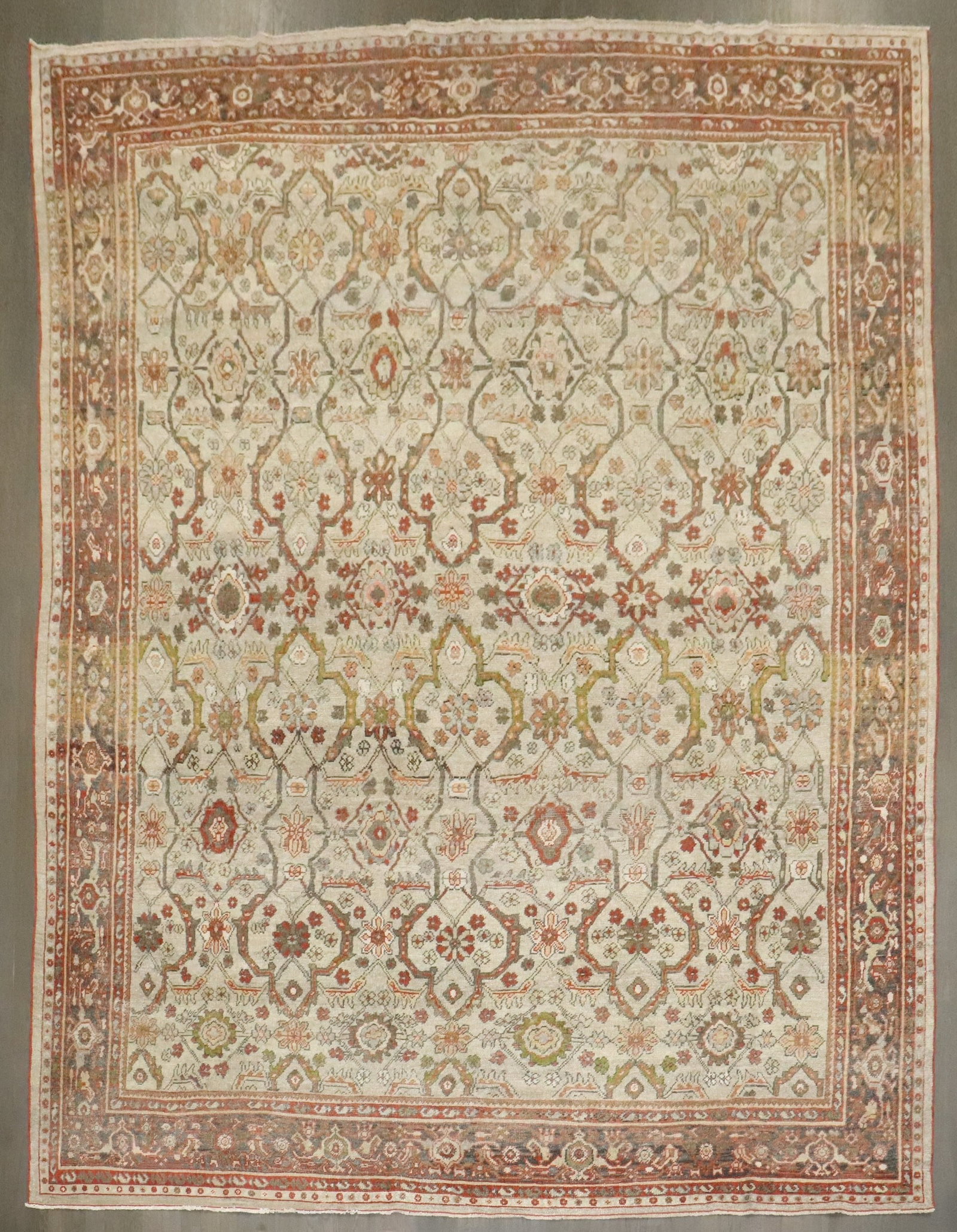 8' 6" x 11' 4" Early 20th Century Persian Mahal Carpet: 8' 6" x 11' 4" Early 20th Century Persian Mahal Carpet Early 20th century Persian Mahal carpet with an ivory field in a room-size format. This pre-owned rug is identified as a Sultanabad/Mahal type. S