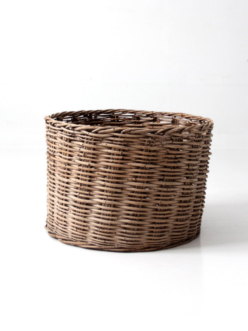 Round Antique Woven Storage Basket 21 inch by 14.75 inch: Round Antique Woven Storage Basket 21 inch by 14.75 inch This antique large woven basket features a rounded form and natural tone, making it a versatile piece for both functional use and decorative di