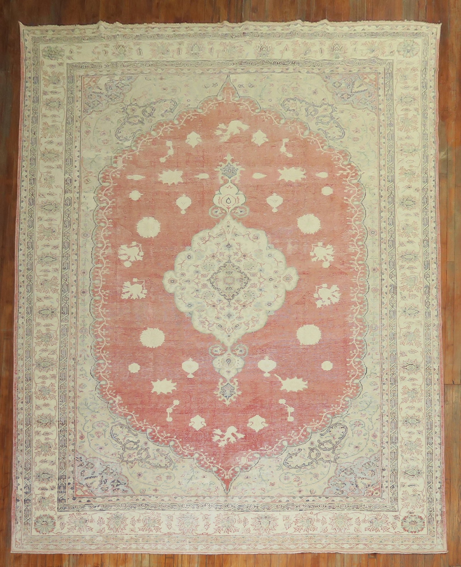 10' 5" x 15' 2" Antique Turkish Oushak Rug Soft Red: 10' 5" x 15' 2" Antique Turkish Oushak Rug Soft Red Antique Turkish Oushak rug from the early 20th century featuring a soft red field with a medallion and border design and a floral feel. This oversiz