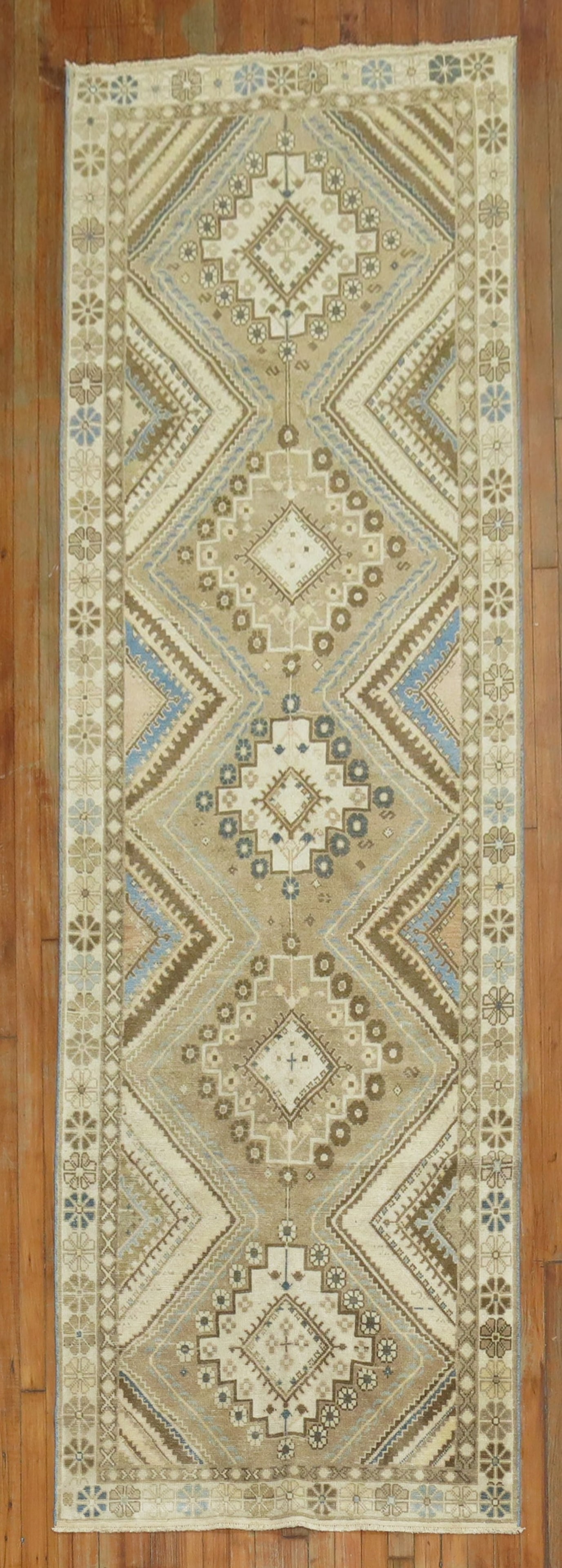 3' 5" x 10' 2" Hamadan Persian tribal runner rug: 3' 5" x 10' 2" Hamadan Persian tribal runner rug Mid-20th century Tribal Persian runner in the Hamadan type, featuring a geometric design. This pre-owned runner offers a classic tribal look suited to 