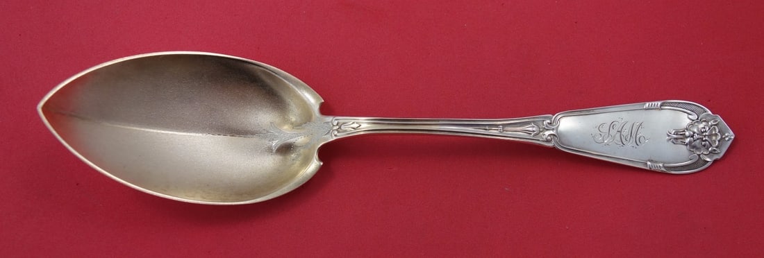 Vanderslice Gargoyle Sterling Silver Berry Spoon Gold Wash Frosted Bright-Cut 8 3/4": Vanderslice Gargoyle Sterling Silver Berry Spoon Gold Wash Frosted Bright-Cut 8 3/4" This exquisite Gargoyle Berry Spoon, crafted by Vanderslice, showcases stunning sterling silver artistry from the l